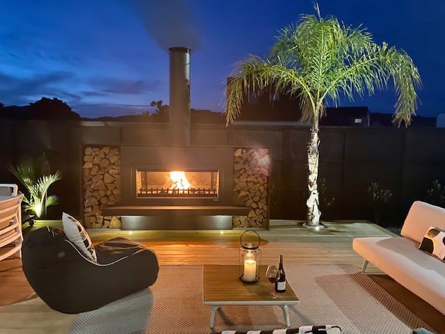 Outdoor fireplace with lighting