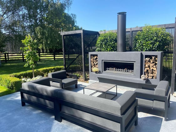 Outdoor fireplace with woodboxes
