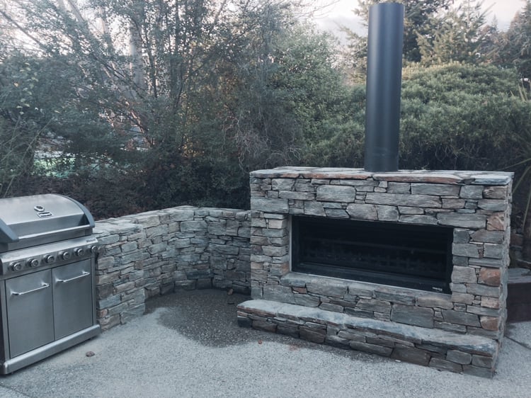 natural stone outdoor fireplace
