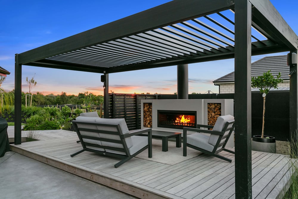 Outdoor area with louvres and fireplace