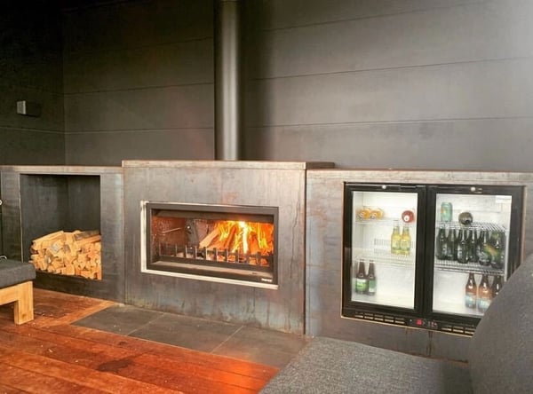 Outdoor fireplace cladded in steel