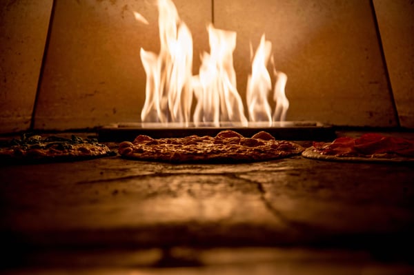 pizza in pizza oven