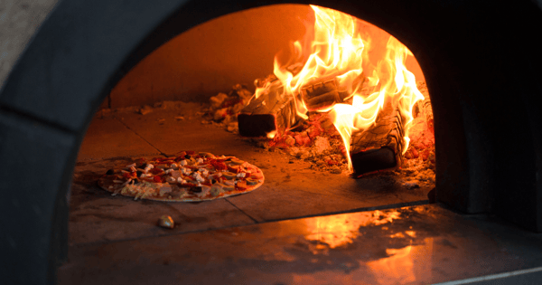 How to cook pizza in a brick pizza oven