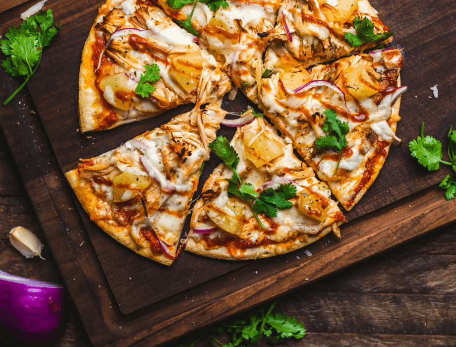 Woodfire oven pizza with even layer of toppings