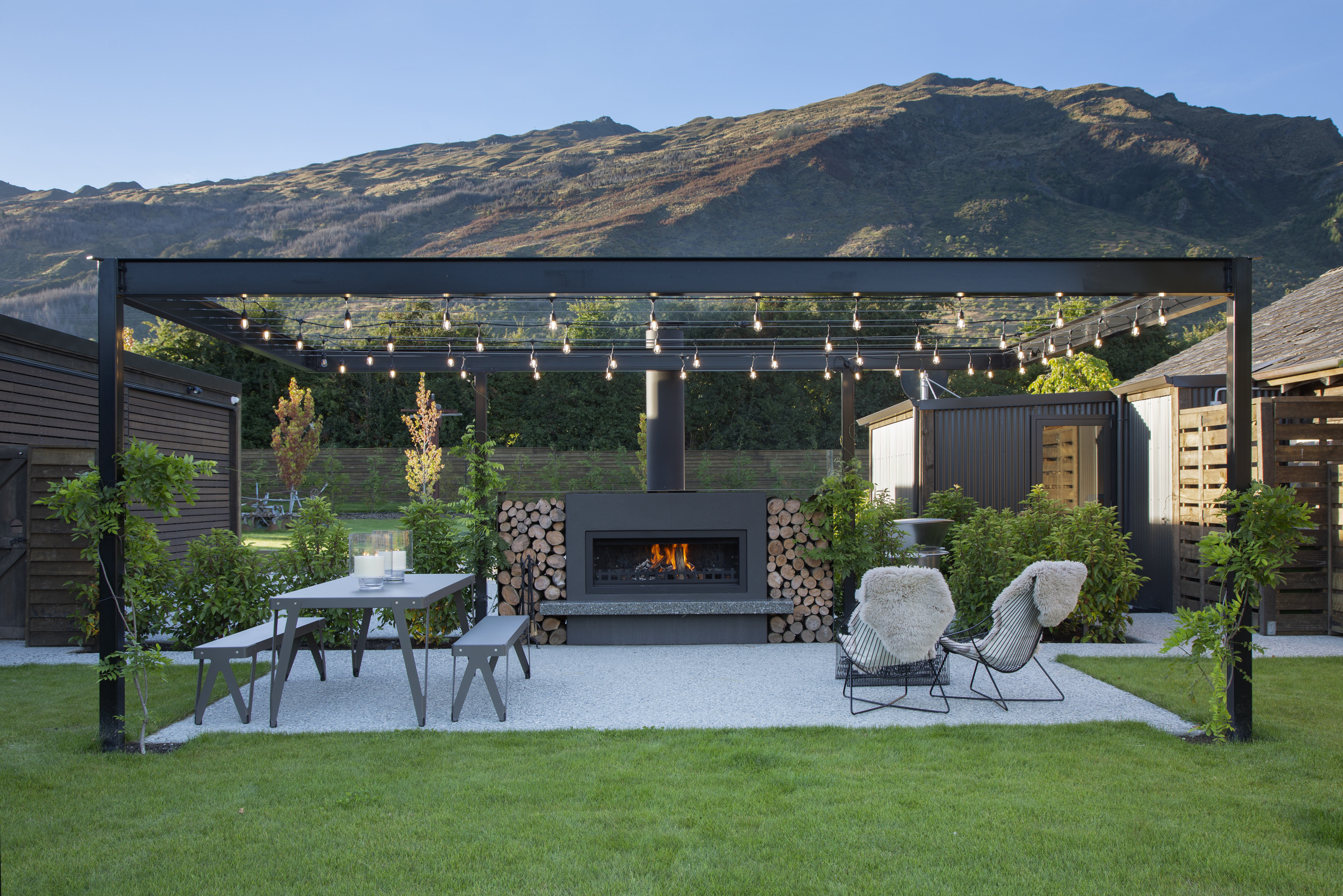 Outdoor trends 2019 - outdoor fireplace situated in an outdoor entertaining area